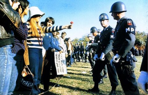 1-Flower_Power_A_demonstrator_offers_a_flower_to_military_police_at_an_National_Mobilization_Committee_to_End_the_War_in_Vietnam_sponsored_protest_in_Virginia_1967