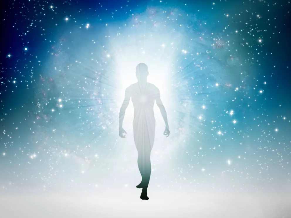 Lidská postava vystupující z vesmíru