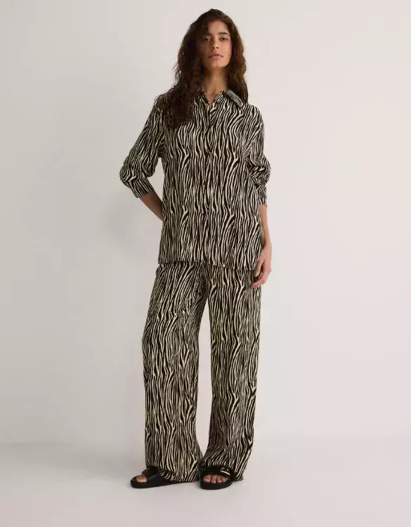 Kalhoty se zvířecím vzorem, Reserved, 399 Kč