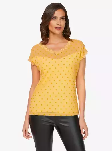 Zpátky do osmdesátek: Puntíky a vycpaná ramena hlásí velkolepý návrat. Hlavně po 50 je noste podle našich tipů