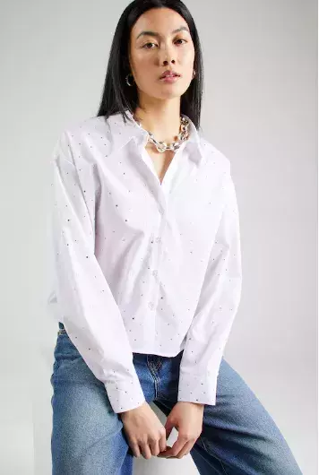 Francouzský šik bez námahy: Jak se oblékat jako Pařížanka po padesátce