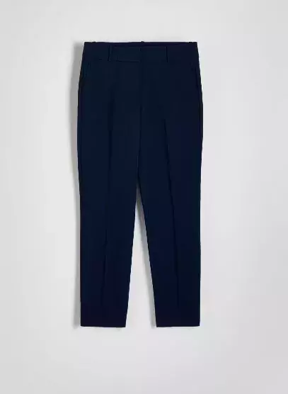 Cigaretové kalhoty z 80. let jsou zpět - tady je návod, jak je nosit po 50, abyste v nich omládla a ukázala postavu