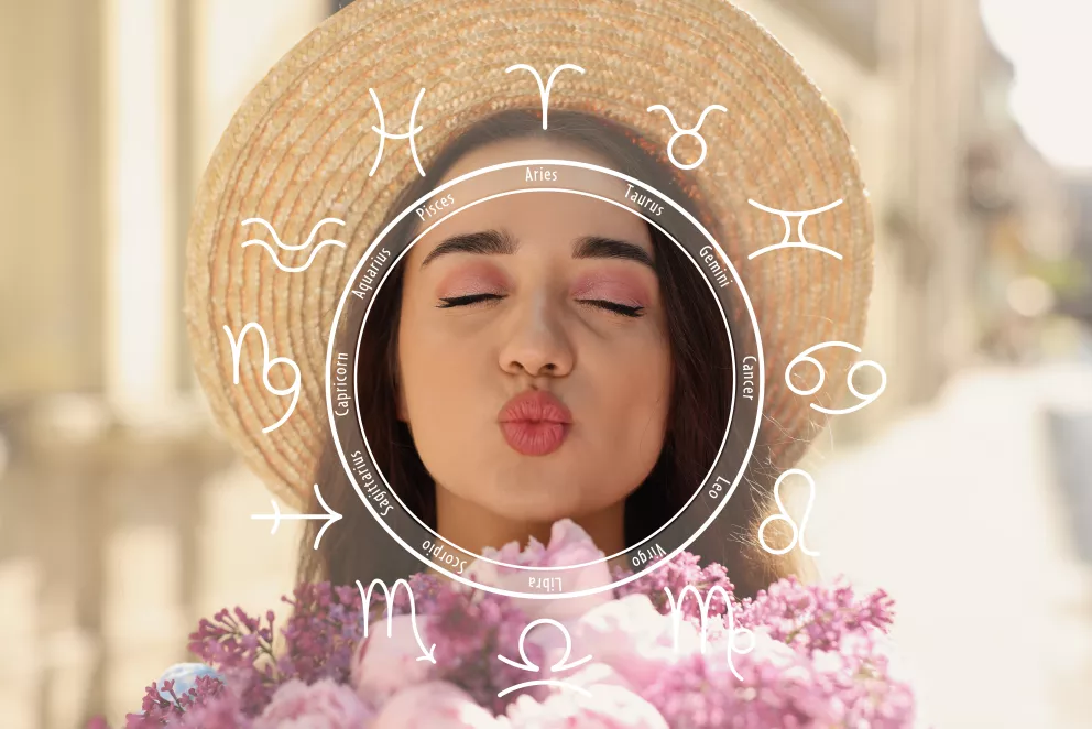 žena s květinami v létě se symbolem zvěrokruhu