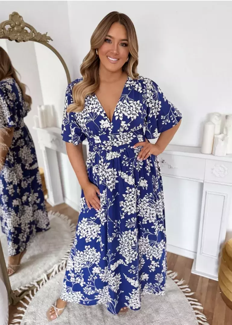 <p>Modré maxi šaty s květinami, Zazza, 1159 Kč</p>
